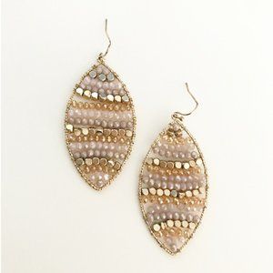 Pink and golden leaf earrings.